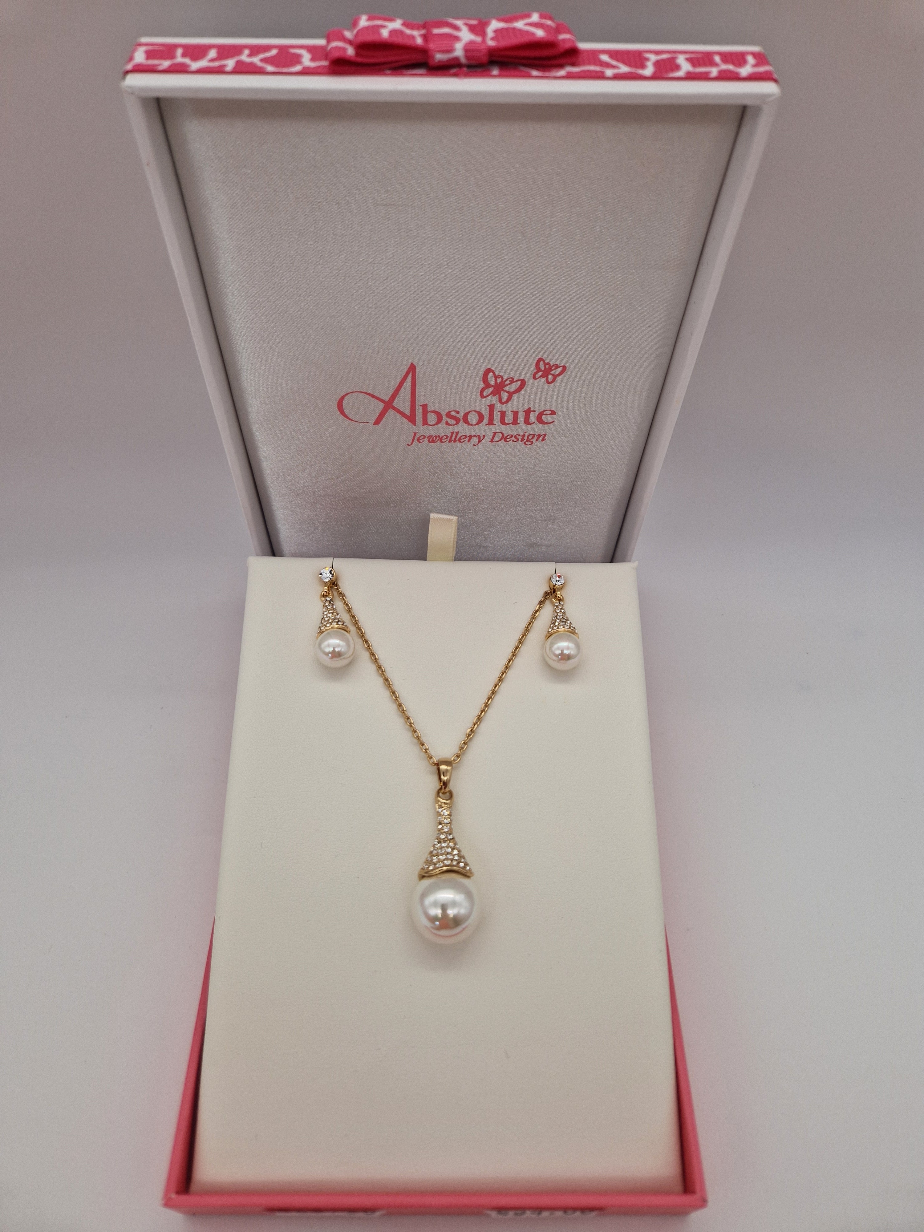 Absolute Gold Pearl Long Pendant And Drop Earrings Set